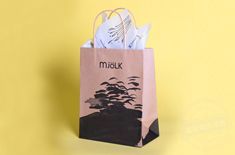 帶有徽標(biāo)的包裝紙袋增進(jìn)營(yíng)銷(xiāo)   如何定制包裝紙袋[吉彩四方]